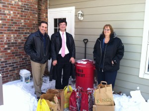 Dr Bret Hartman, Rob DiCerbo and Sue Bolleen delivering food to the New Hope pantry.